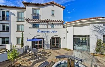 Mariposa salon entrance with outdoor seating area